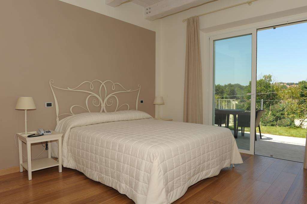 Hotel Giardino Suites And Spa - נומאנה חדר תמונה