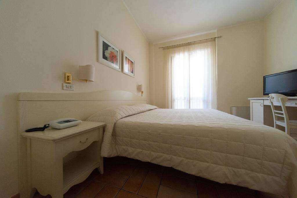 Hotel Giardino Suites And Spa - נומאנה חדר תמונה